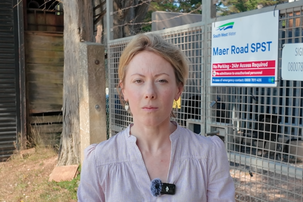 Charlotte outside South West Water's Maer Lane sewage pumping station